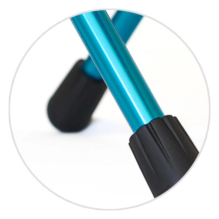 Close-up of two metallic blue tubular legs with black rubber tips, likely part of a small piece of furniture or equipment, against a plain white background.