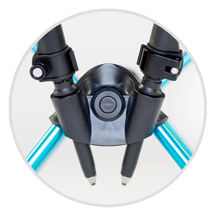 Close-up of the central joint of a drawing compass with two adjustable black arms and blue metallic legs, displayed on a white background.
