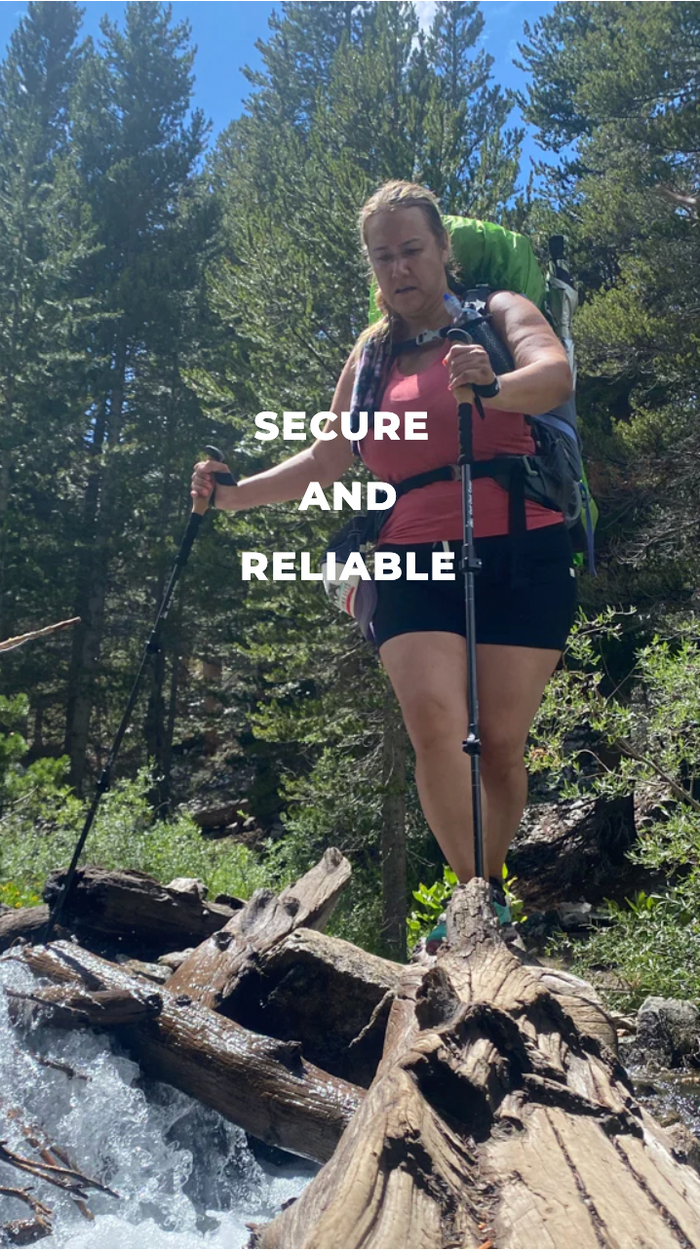 A woman with a backpack crosses a log over a stream in a forest, using trekking poles. The words SECURE AND RELIABLE are written across the image. Tall pine trees and sunlight fill the background.