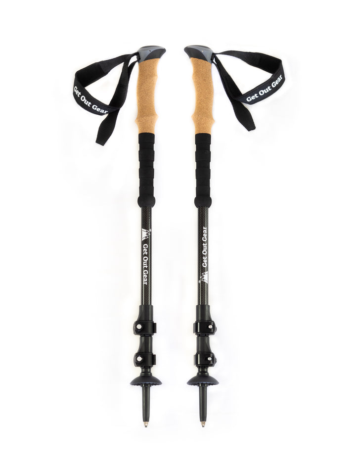 Get Out Gear Goat Stix ultra-strong carbon fiber trekking poles with cork grips and adjustable flip locks, shown standing upright against a white background.